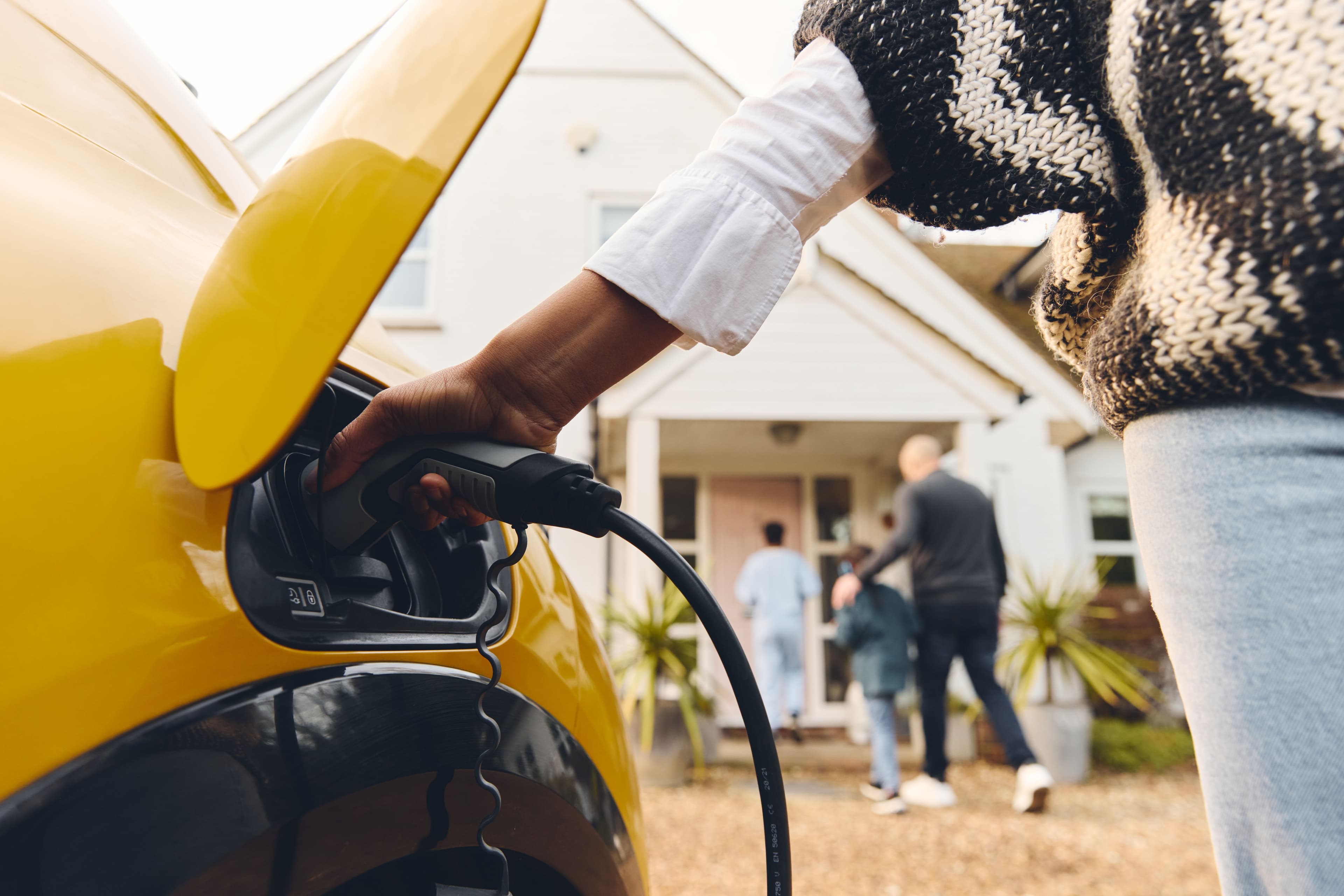 Electric vehicle being charged
