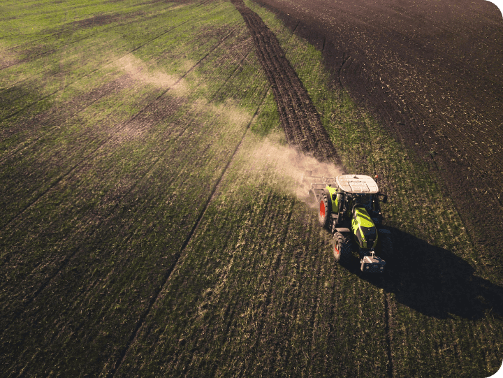 Tractor at work ploughing a field
