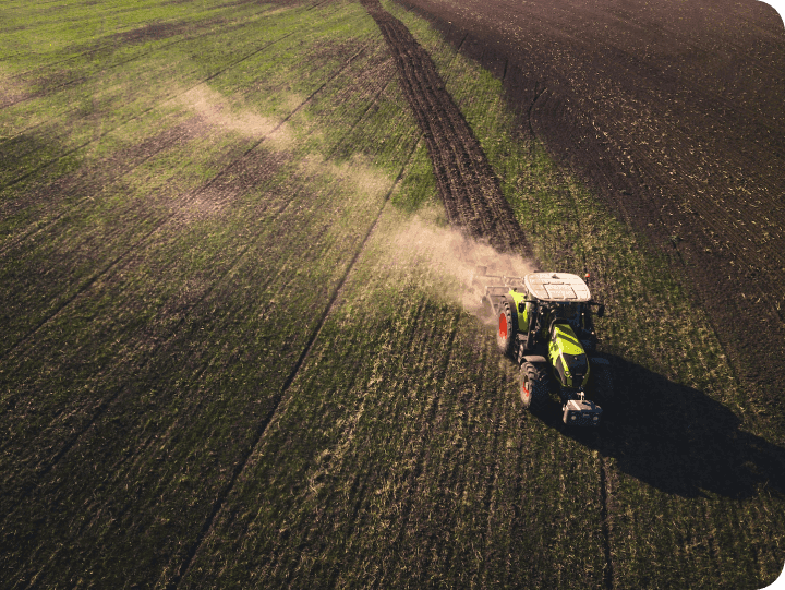 Tractor at work ploughing a field 