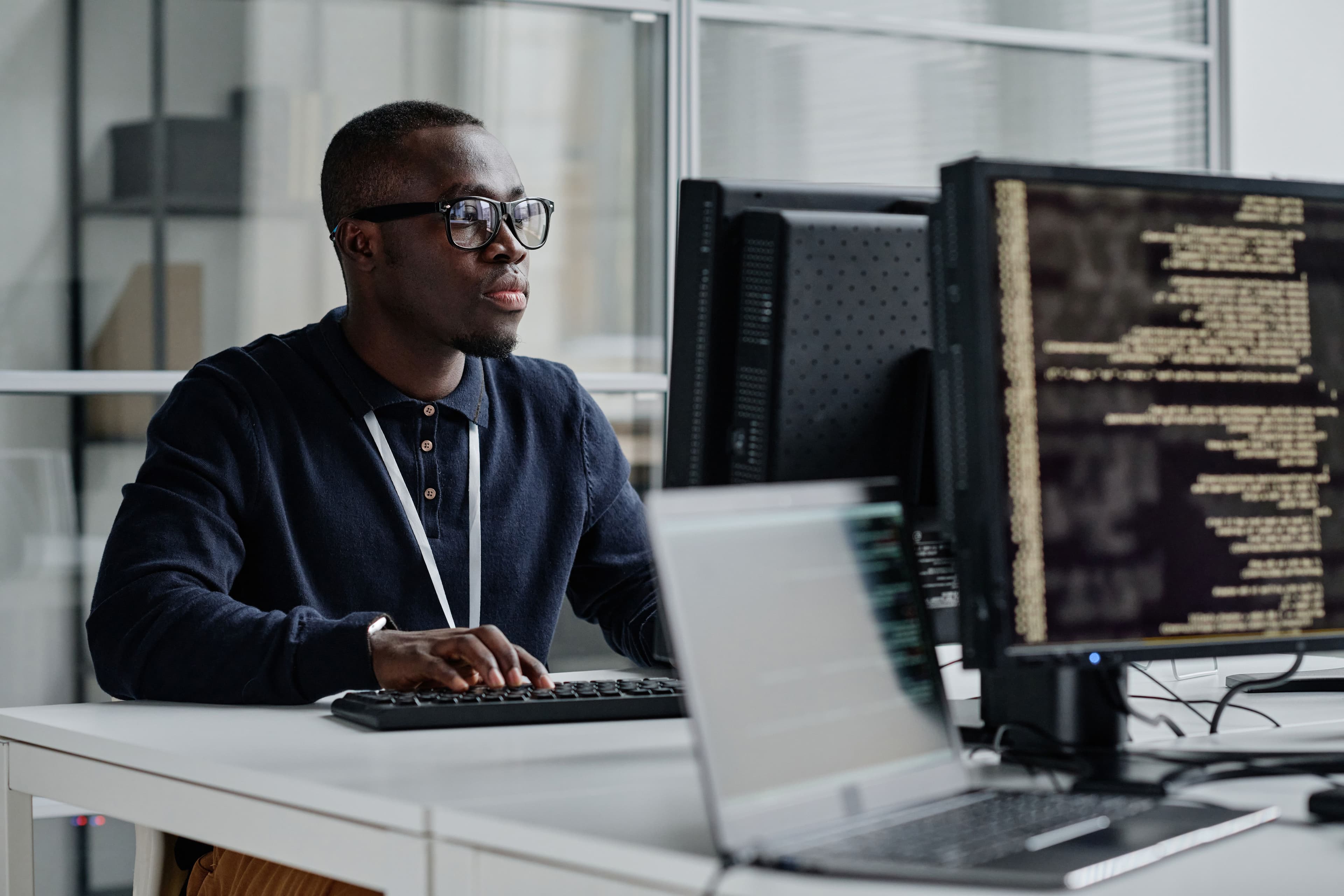 A developer sat at their desk working