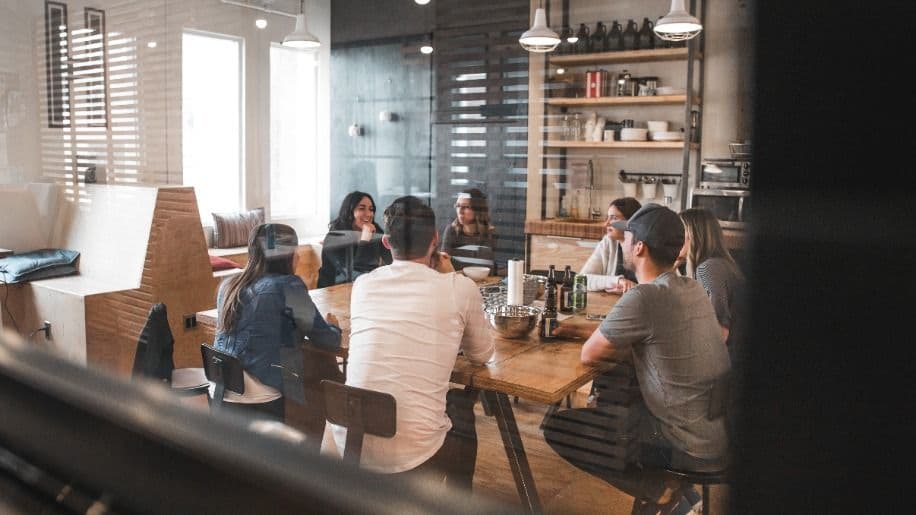 Multiple people attending a business meeting